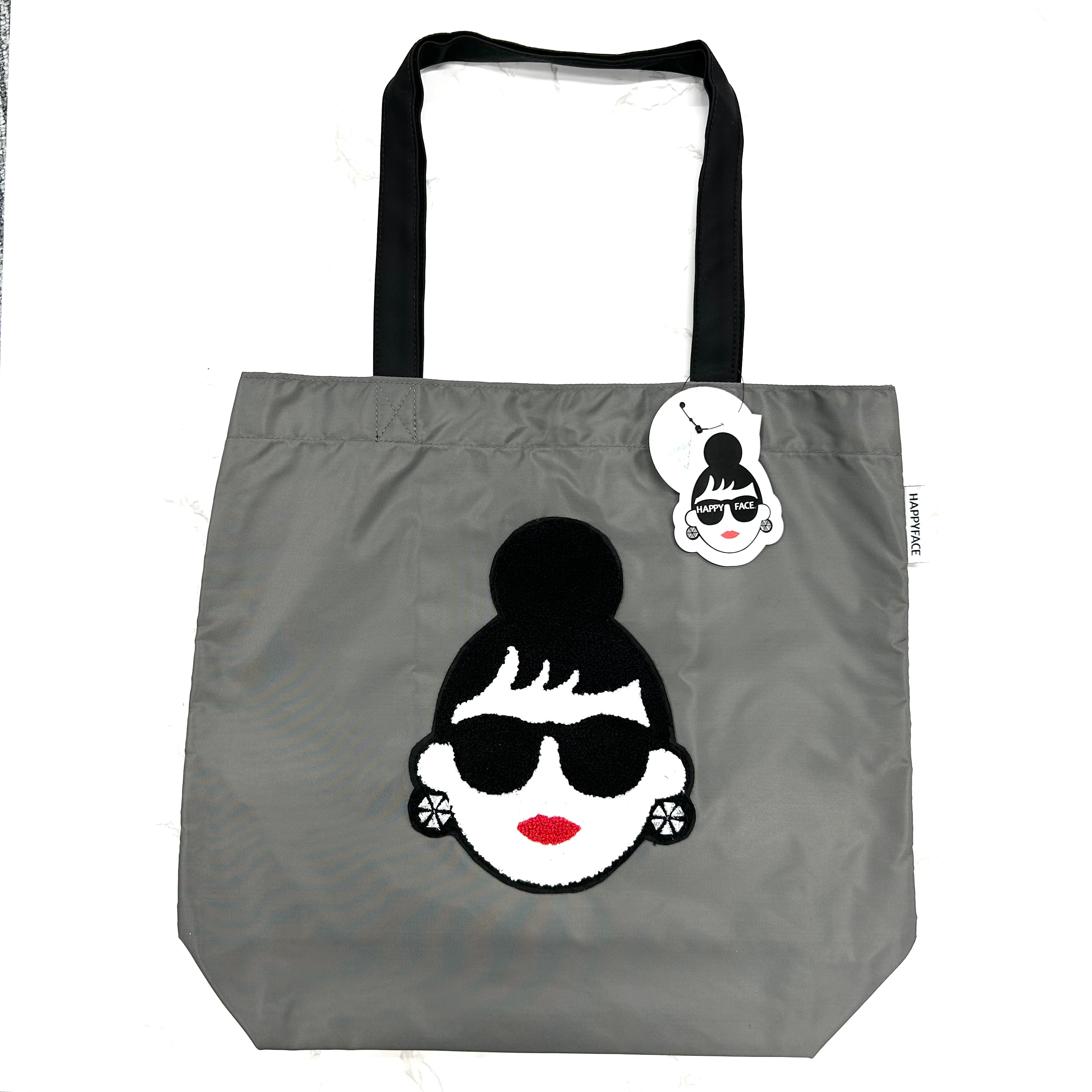 【HAPPYFACE】ＥＭＭＡ フェイス刺繡トートバッグ グレー　※7/30〜8/5迄に順次発送予定